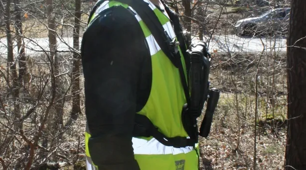 Person från sidan med tactile bärsele